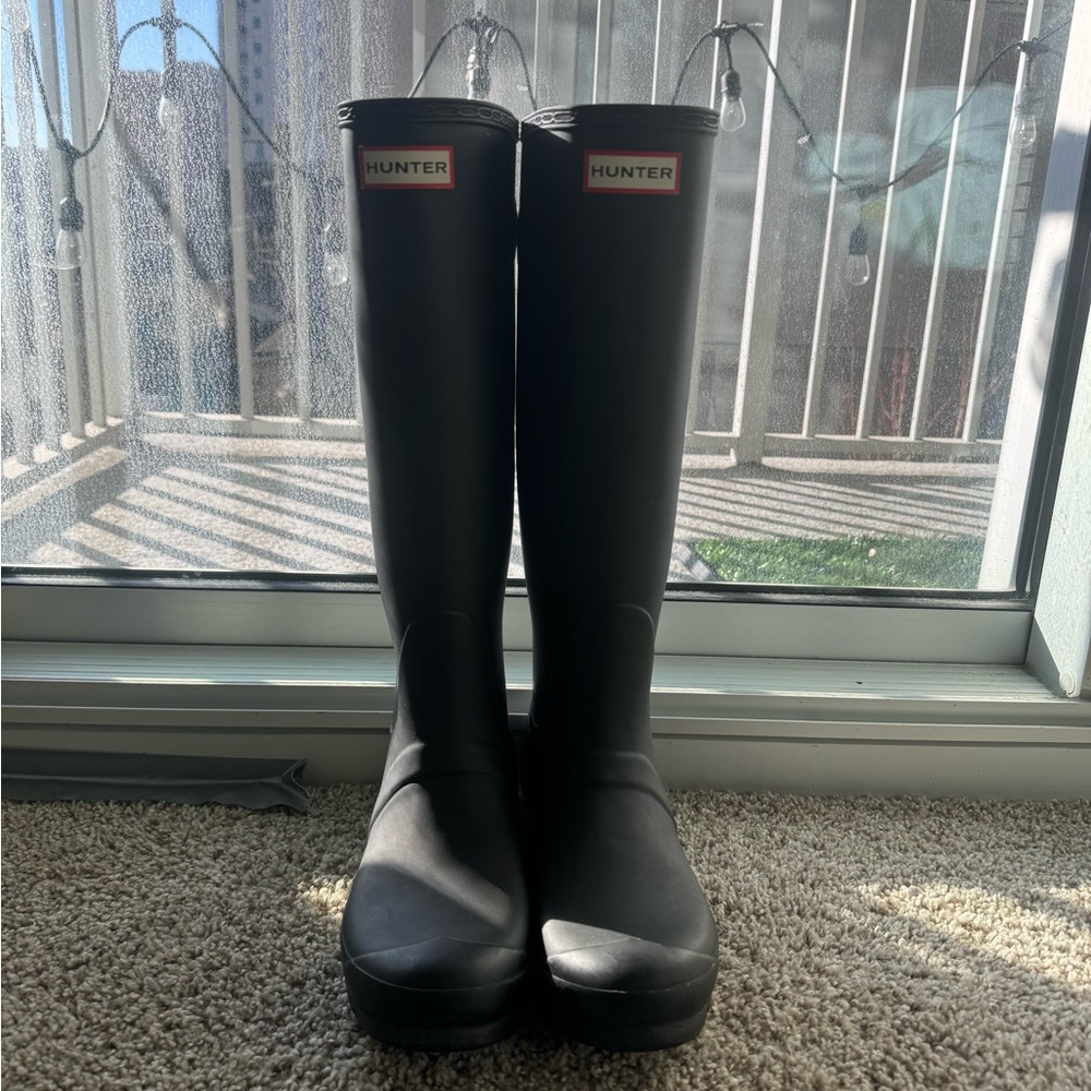 Black tall hunter rain boots
